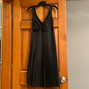 Black pleated dress.